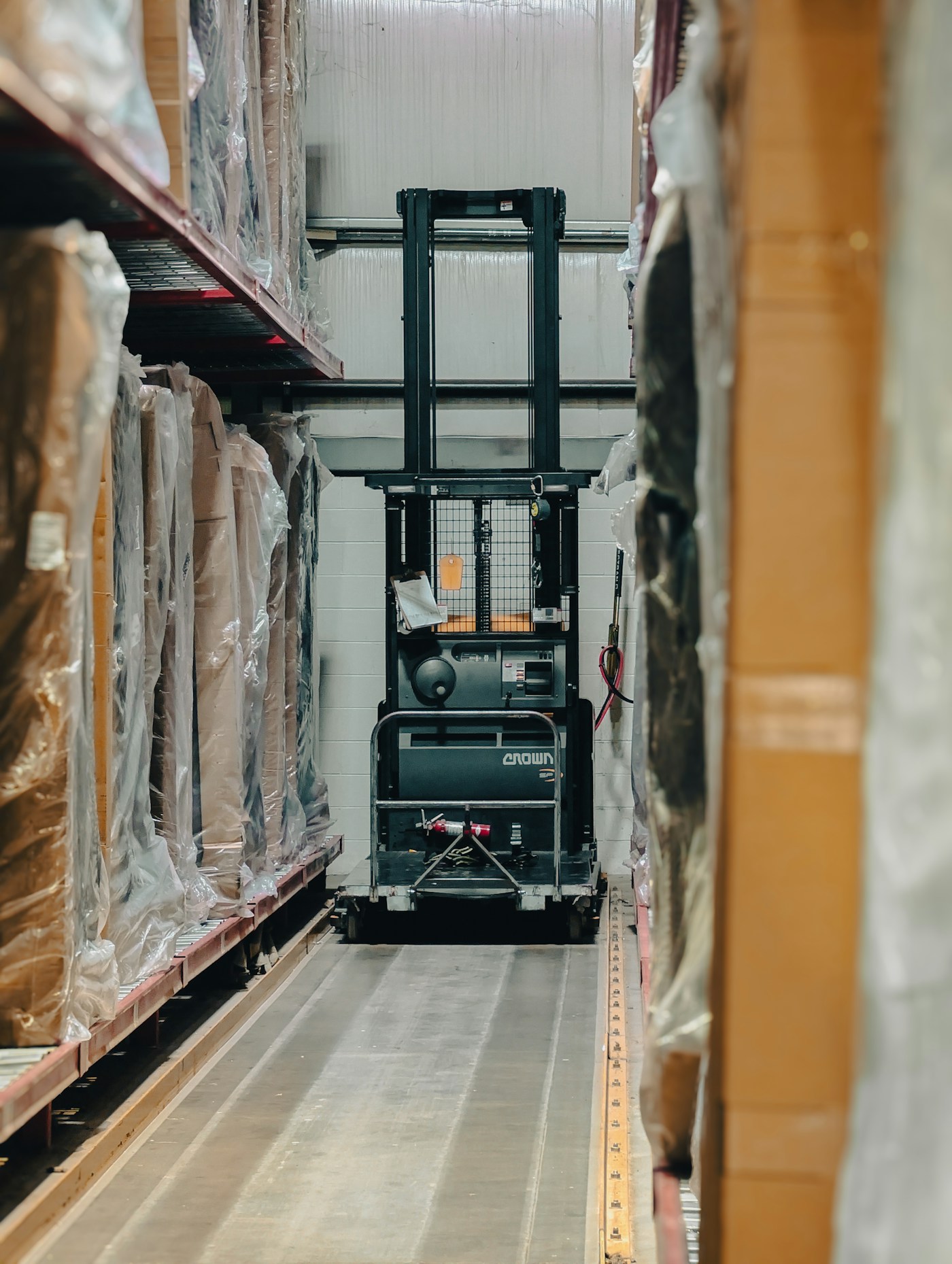 Warehouse operations with stocked pallets and logistics equipment